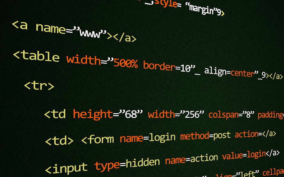 A close-up photograph of a computer screen displaying lines of colorful programming code in various shades of red, yellow, green, blue, and white. The text consists of HTML, CSS, or JavaScript syntax,